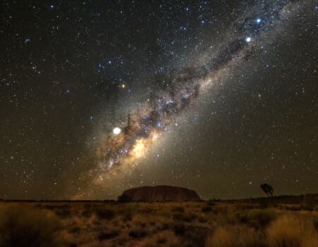 Uluru under the night sky.
